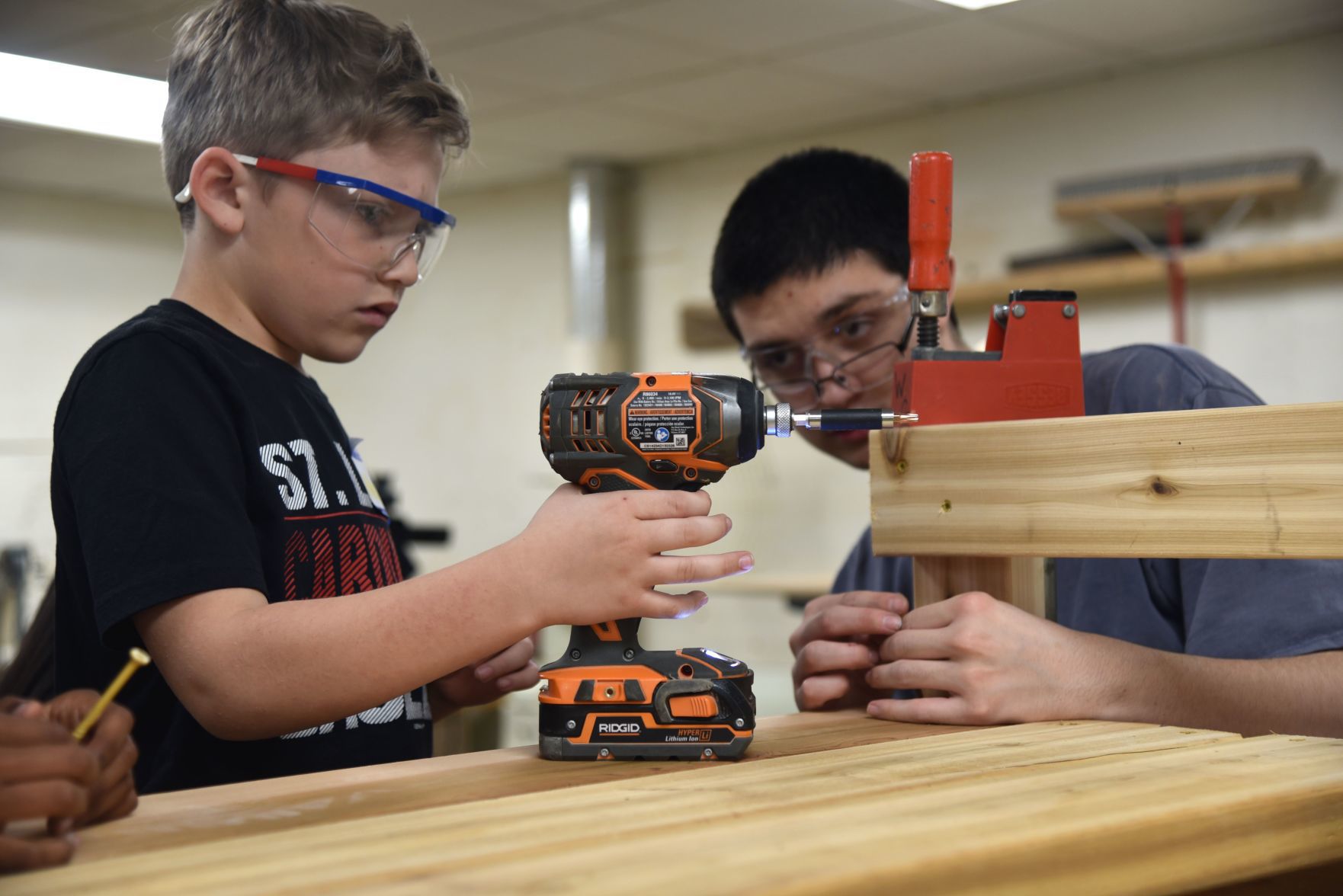 High School student Jake Neville and third grader Mason LaBerta.jpg